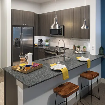An apartment interior of a kitchen
